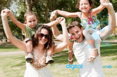 Family In The Park Stock Photo