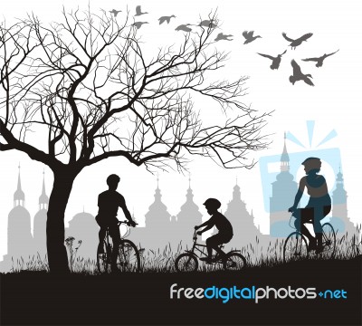 Family On Bicycle Trip Out Of Town Stock Image