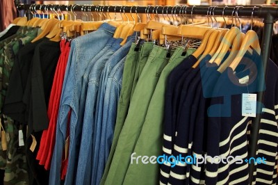 Fashion Clothing On Hangers In A Shop Stock Photo