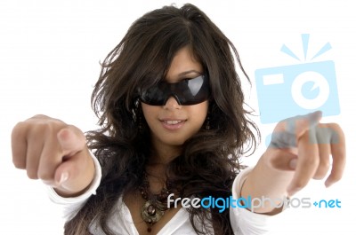 Fashion Model Pointing With Both Hands Stock Photo
