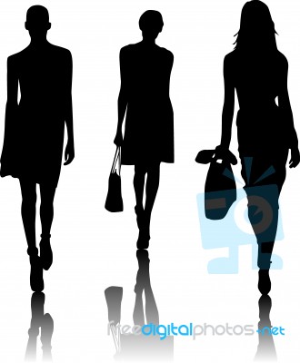 Fashion Silhouette Girls walking Stock Image