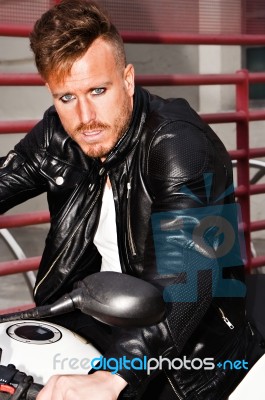 Fashionable Young Man In A Motorbike Stock Photo