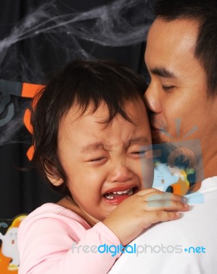 Father Carrying His Crying Child Stock Photo Father Carrying His Crying Child Stock Photo