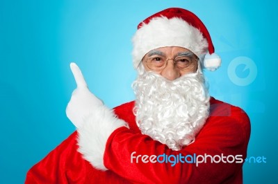 Father Christmas Pointing Away, Copy Space Area Stock Photo