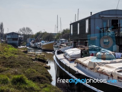 Faversham, Kent/uk - March 29 : Assorted Boats Moored In A Creek… Stock Photo