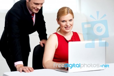 female Boss Working With PA Stock Photo