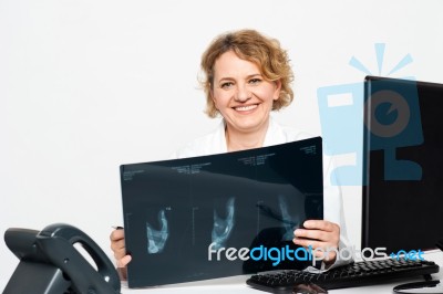 Female Doctor Holding X Ray Stock Photo