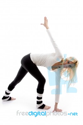 Female doing stretching Exercise Stock Photo