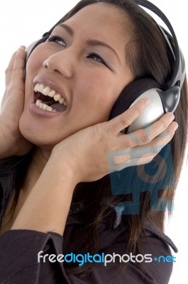 Female Enjoying Headphone Stock Photo
