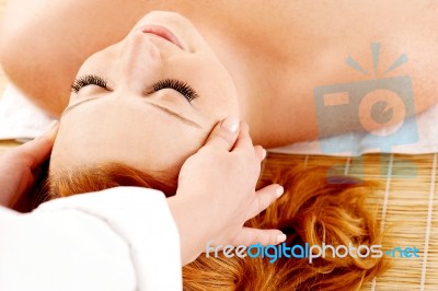 Female Getting A Head Massage Stock Photo