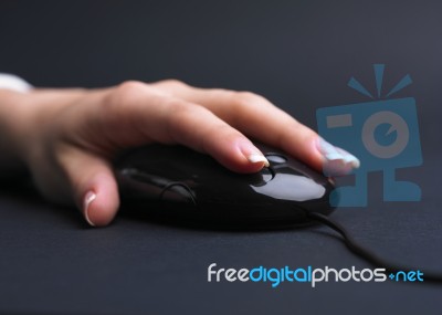 Female Hand Using Mouse Stock Photo