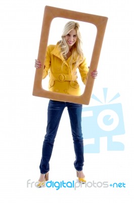 Female Holding Frame Stock Photo