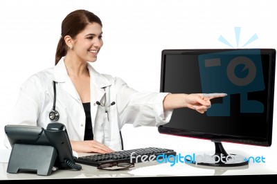 Female Physician In Her Clinic Stock Photo