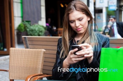 Female Shopper Texting Stock Photo Female Shopper Texting Stock Photo