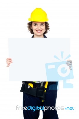 Female Worker Holding Blank Whiteboard Stock Photo