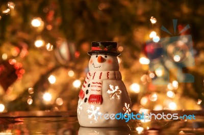 Festive Snowman With Christmas Light Background Stock Photo