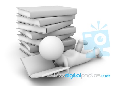 Figure Lying Down Reading Book Stock Image
