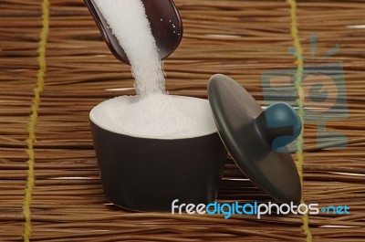 Filling Salt Into Salt Cellar Stock Photo