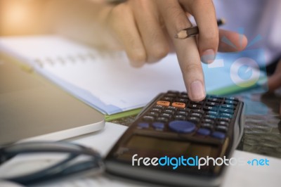 Financial Data Analyzing Hand Writing And Counting On Calculator… Stock Photo