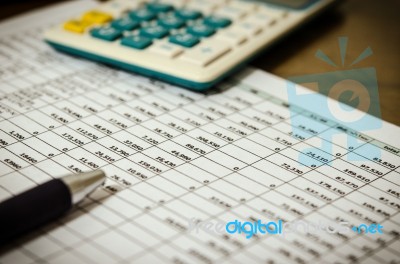 Financial Data Table And Calculator Stock Photo