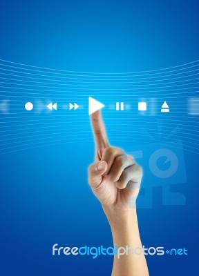 Finger Pushing Play Button Stock Image