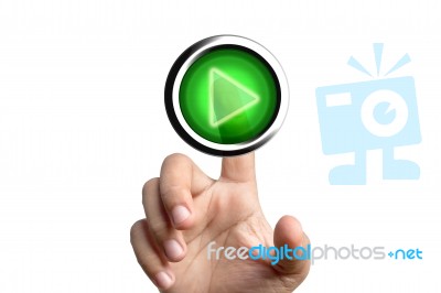 Finger Pushing Play Button Stock Photo