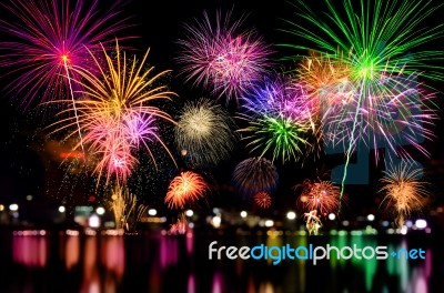 Fireworks Celebration And The City Night Light Background Stock Photo