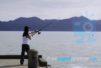 Fisherman Fishing Trolling In The Sea Stock Photo