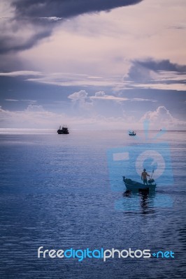 Fisherman On Boat Stock Photo Fisherman On Boat Stock Photo