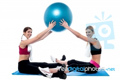 Fit Women Practicing With Pilates Ball Stock Photo