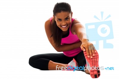 Fitness Girl Doing Stretching Exercise Stock Photo