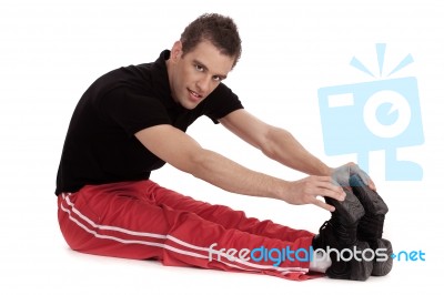 Fitness Men Stretches His Leg Stock Photo