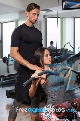 Fitness Woman With Personal Trainer Stock Photo