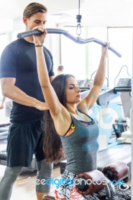 Fitness Woman With Personal Trainer Stock Photo