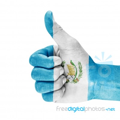 Flag Of Guatemala On Thumb Up Hand Stock Photo