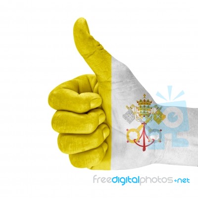 Flag Of The Vatican City On Thumb Up Hand Stock Photo