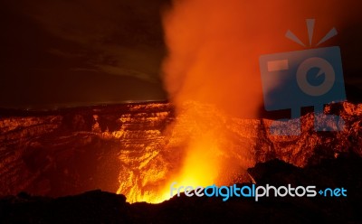 Flame In Volcano Crater Stock Photo