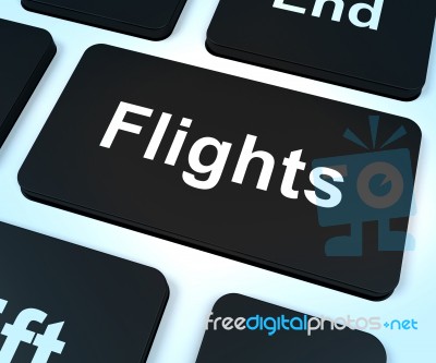 Flights Computer Key For Overseas Vacation Or Holiday Booking Stock Image