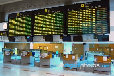 Flights Information Board In Airport Stock Photo