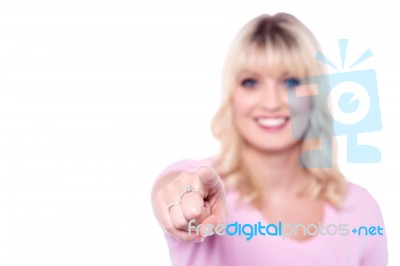 Focused Image Of Woman's Hand Pointing At You Stock Photo
