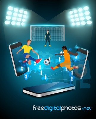 Football Player Striking The Ball On Mobile Phones Stock Image