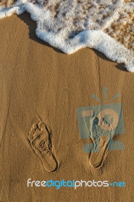 Footprints On Sand Stock Photo