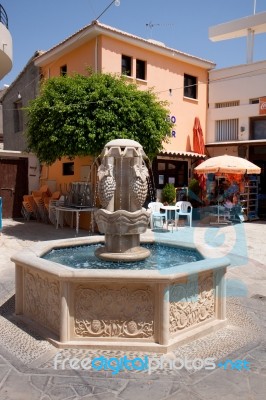 Fountain In The Village Square At Pissouri Stock Photo