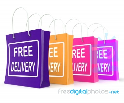 Free Delivery Shopping Bags Showing No Charge Or Gratis To Deliv… Stock Image