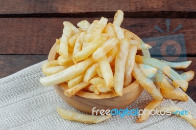 French Fries On Tablecloth Stock Photo