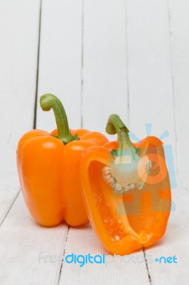 Fresh And Colorful Orange Bell Peppers Stock Photo
