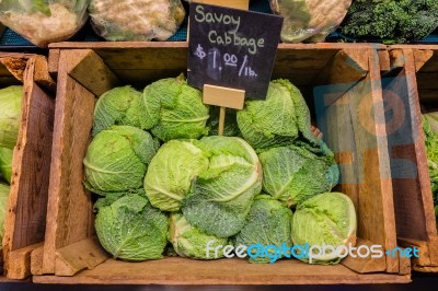 Fresh Cabbage Vegetable In Wooden Box Stall In Greengrocery With Price Chalkboard Label Stock Photo