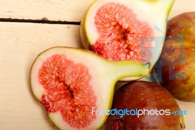 Fresh Figs On A Rustic Table Stock Photo