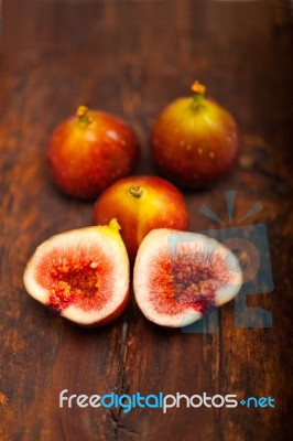 Fresh Figs Over Old Wood Stock Photo