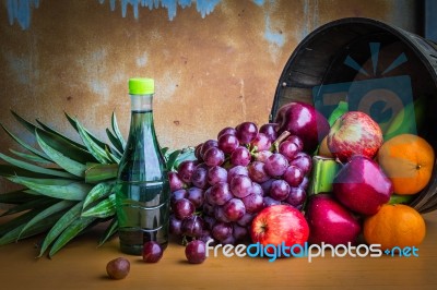 Fresh Fruits On A Wooden Table Stock Photo